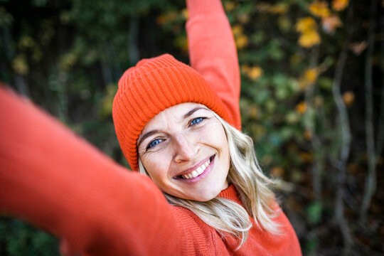 Mature woman with blue eyes enjoying on weekend