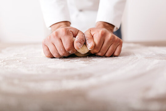 Chef preparing dough for ravioli