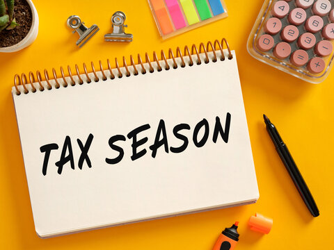 Tax season deadline planning with financial paperwork