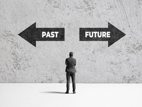 Businessman considering choices between past and future directions