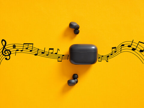 Wireless earbuds playing a melody with music notes