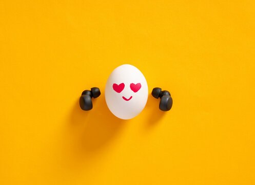 Egg character with heart eyes enjoying music
