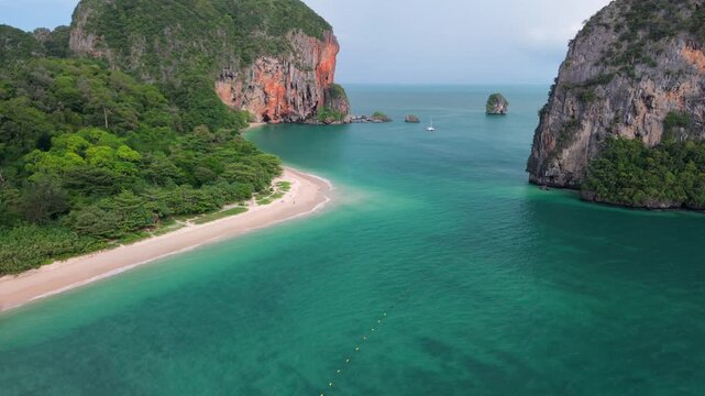 Aerial view of Phra Nang Cave Beach and Railay Beach with majestic limestone cliffs in Krabi, Thailand.