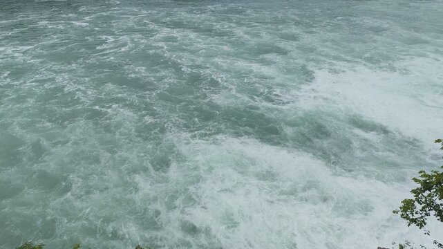 Rhine Falls Waterfall with Cascading Water Neuhausen Switzerland. Powerful Water fall Stream Rheinfall top view.