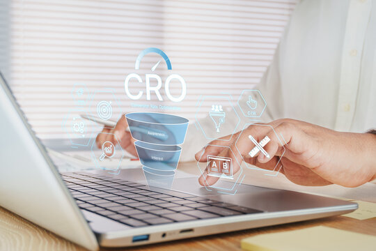Business professional optimizing conversion rate on laptop with CRO dashboard, digital marketing analytics, sales funnel, A B testing, customer journey optimization, CTR measurement marketing strategy