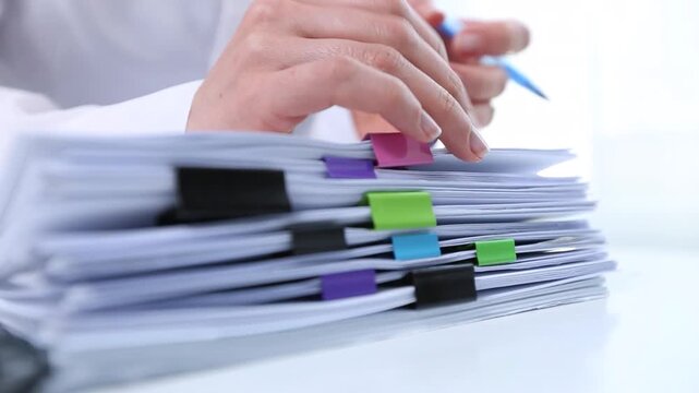 Stack Of Business Documents And Reports On Office Desk FHD