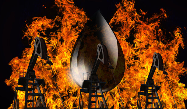 Oil pump jacks with large fire and smoke in background 