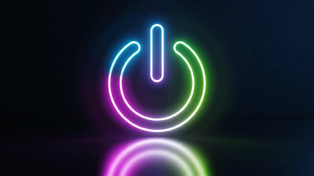 Neon power button symbol glowing with multiple colors on a dark background showing reflection