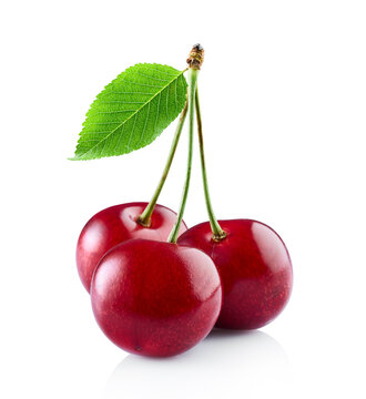 Cherry in closeup with leaf