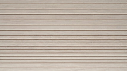 Fototapeta premium Light beige wood wall paneling with horizontal grooves and fine grain texture, close-up view of slatted interior cladding