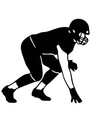 Fototapeta premium American football player in starting stance. Athlete silhouette ready for the game.