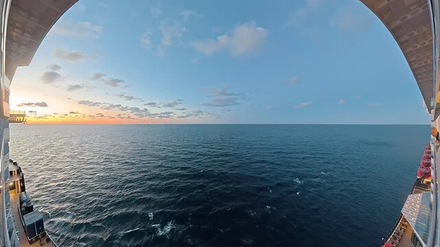 Extreme wide angle sunset over the ocean from cruise ship