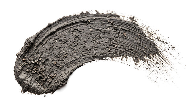 Smear of black charcoal face mask scrub isolated on white background