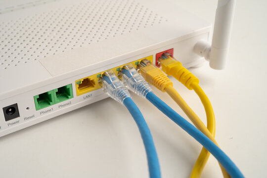 Ethernet cable with wireless router connect to internet service provider network.