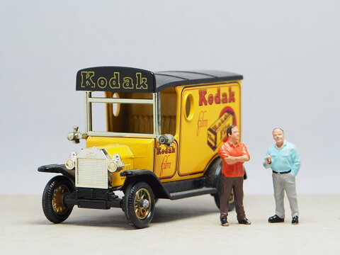 Indonesia - March 16, 2023 : Mini toy of car at table with blurred background.