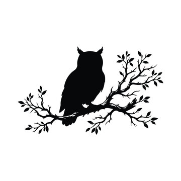 Black silhouette of an owl perched on a tree branch for halloween or nature themed design.