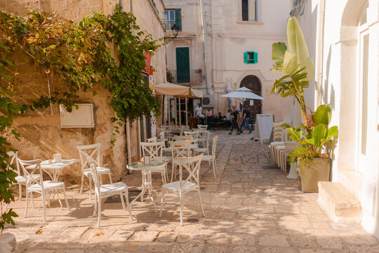 Outdoor restaurant patio in Monopoly, Italy 