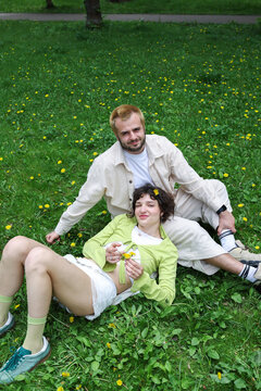 young couple walking in the park