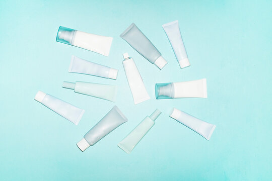 Blue turquoise colour mockup skincare beauty product tubes with space