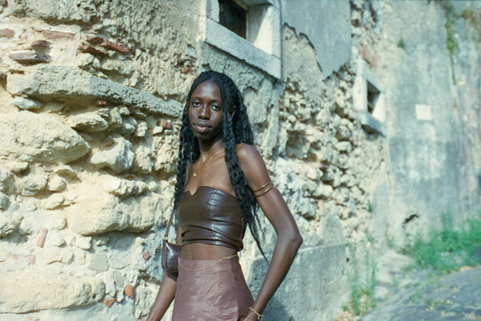 Portrait By Stone Wall