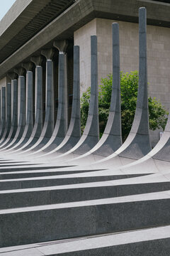 Abstract Geometric Rows of Curved Granite Pillars