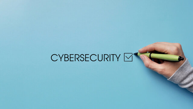 Hand Checking Cybersecurity Checklist for Digital Protection and Online Safety