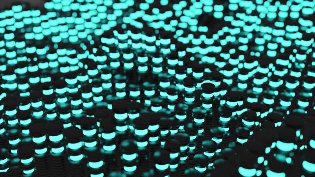 An array of dark metallic cylinders with glowing cyan bands shifts in a rhythmic wave pattern across the frame.
