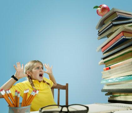 School Problem - A Pile Of Books Threatens To Fall On The Student