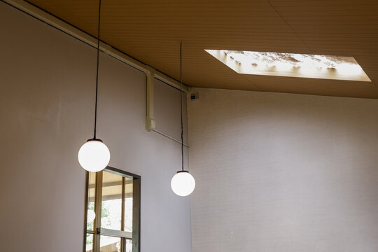 Modern lamp on the ceiling in living room at home,Interior design of dining room,house interiors,Space for text.