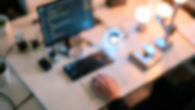 Defocused modern AI workstation with glowing lights for website hero