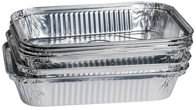 Stacked aluminum foil trays isolated on a transparent background, showcasing food containers for catering, takeout, and convenient meal storage solutions
