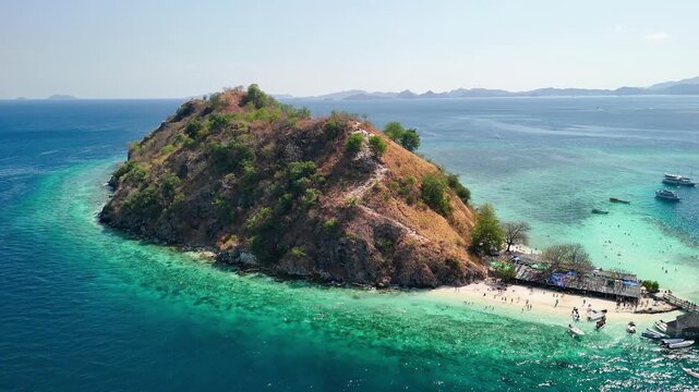 Spectacular drone view of Kelor Island with white sand and