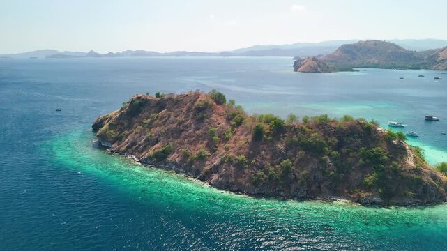 Cinematic aerial shot of Pulau Kelor tropical island in