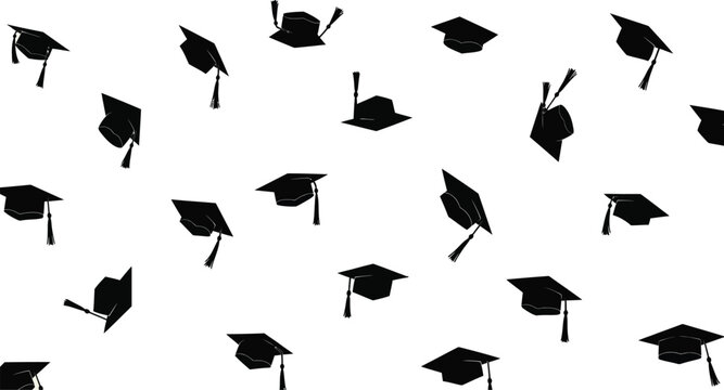 Graduation caps thrown in air by students celebrating