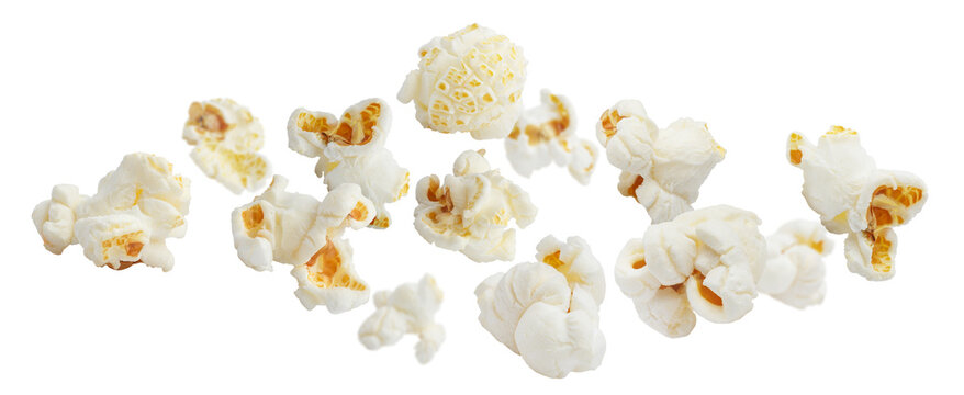 Delicious crispy popcorn flying in dynamic composition, isolated on transparent cutout background