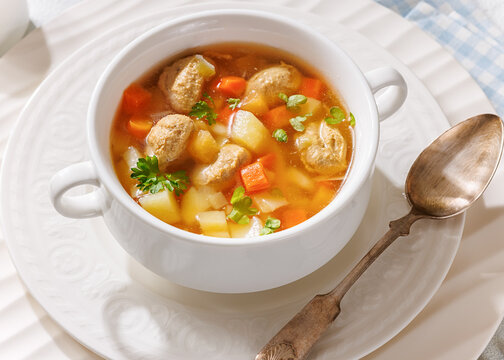 Authentic Polish Zupa z Klopsikami in a bowl