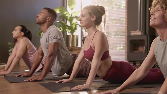 Yoga class group during lesson at gym