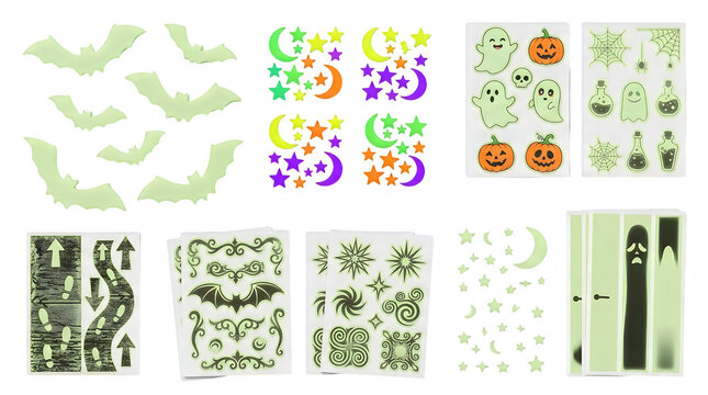 Various glow-in-the-dark Halloween decals and stickers, featuring bats, ghosts, pumpkins, stars, and moons, are displayed on a white background, offering festive decorations.