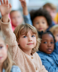 Fototapeta premium Young child raises hand in classroom. Focus on hopeful, curious expression. Diverse peers sit attentively nearby. Bright, soft lighting enhances warm tone. Ideal for education, engagement