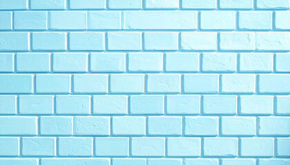 Obraz premium Bright pastel blue brick wall texture background showing painted brickwork details and rustic block stone structure.