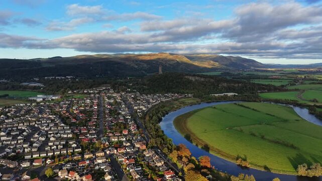 Beautiful Cinematic aerial view of the National Wallace Monument Aerial View Over Stirling, Scotland &ndash; Historic Landmark and Scenic Town Landscape