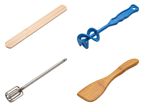 Selection of professional mixing tools including wooden sticks and metal whisk attachments isolated on transparent background for construction paint and home improvement tasks.
