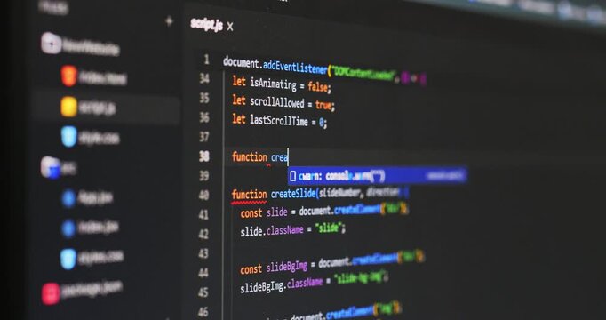 Close-up detail of web software script code typing on screen