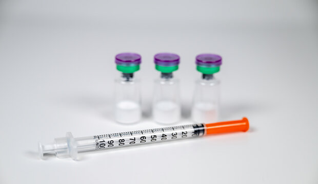 Peptide vials and syringe(s).