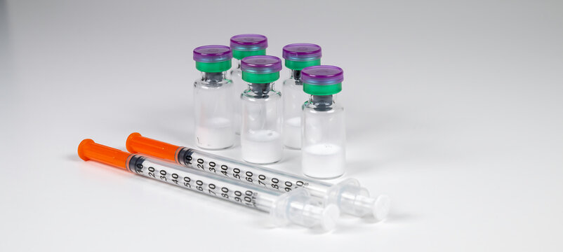 Peptide vials and syringe(s).