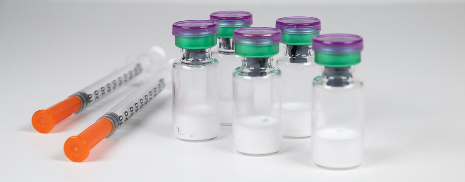 Peptide vials and syringe(s).
