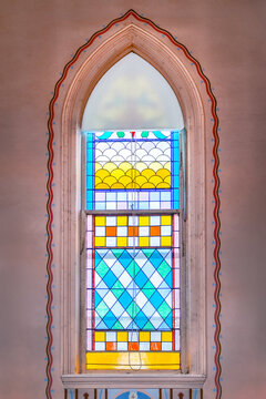 Arched Stained Glass Window in 152 Year Old Catholic Church