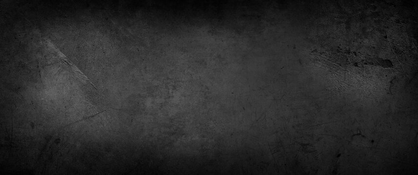 Dark grey textured concrete wall background