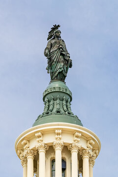 Statue of Freedom Crowning United States Capitol Dome Against Blue Sky In Washington DC Government Landmark