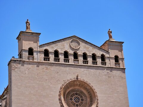 Gothic Cathedral Facade with Rose Window and Statues